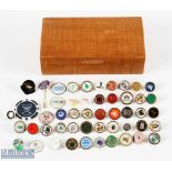 Collection of Golf Ball markers, metals, and plastic to include golf club badge, all within a wooden