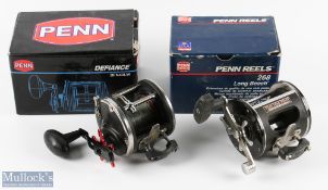 2x Penn Reels - Defiance DFN40LW and 268 Long Beach, both run smooth with light signs of use, both