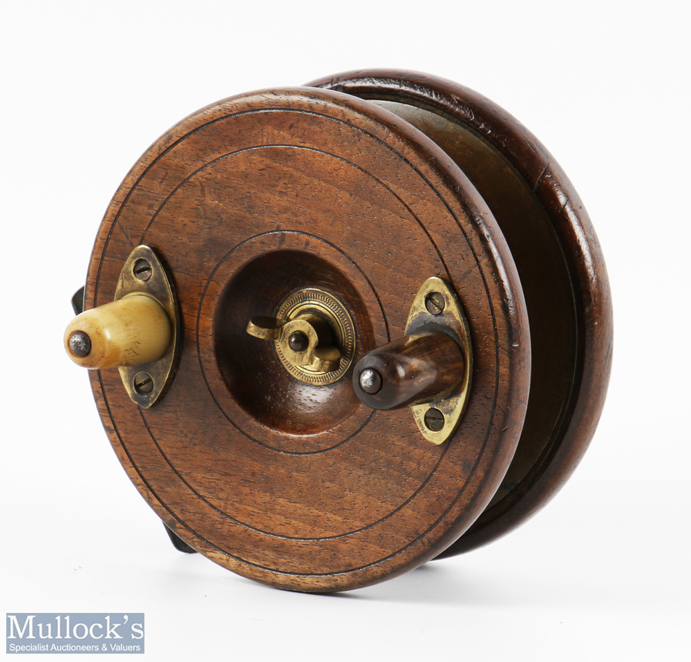 4.5" unnamed 'Roundbacked' brass and wood reel twin handled, on/off check, central wing nut, rear