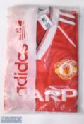 1983/84 Manchester United home football shirt in red Adidas/Sharp, size 36/38, appears in original