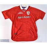 1997/00 Manchester United home football shirt in red, Umbro / Sharp, size XL, with UEFA Champions