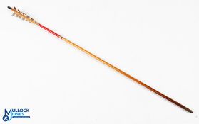 Stuart Homer wooden arrow measures 72cm approx., with metal arrow head, in red decals