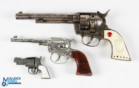 3 Vintage Metal Cap Guns, to include BCM England Sixshot cap gun, Crescent Toys Dakota cap gun and a