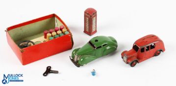 1930s Schuco Telestearing 3000 wind up Tin Car, key and steering wheel, key, cones, and base of