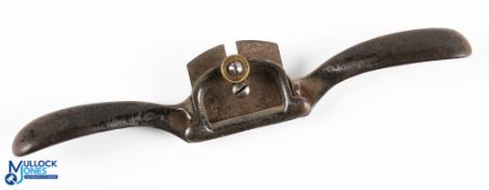 Early Stanley Rule & Level Co Spokeshave, with original blade and brass locking nut, round faced