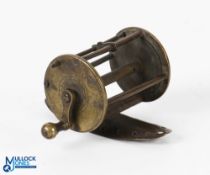 Another very early brass winch with straight lever and round brass handle, 1.5" spool, 2.25" wide