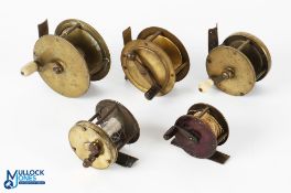 A collection of brass reels, as follows: 3" brass winch with cranked arm and white handle; 2.5"