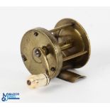 Early unnamed brass multiplier winch with curved crank arm with white handle, 1.75" spool 1.5" wide,