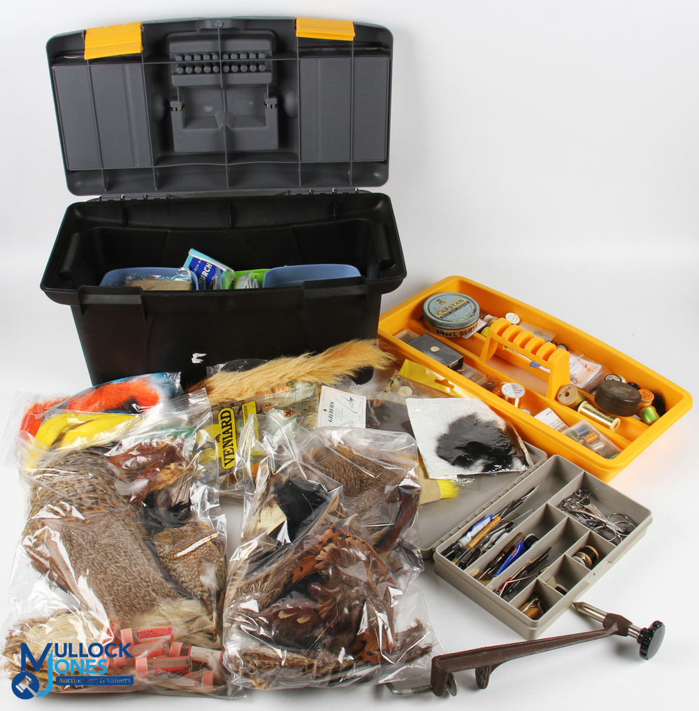 A fly tying kit, comprising: large Focus box with tray 19" x 9" x 9", with fur, feathers, silks,