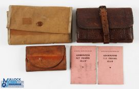 A collection of fishing wallets, made up of: leather 5" x 3.5" with 4 vellum leaves and 2 pockets,