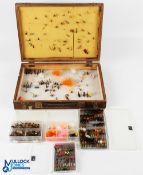 A collection of fly boxes with flies, comprising: a large wood double sided box 13" x 10" x 2.5",