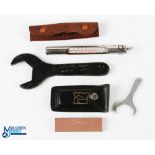 Selection of Hardy equipment, comprising: Hardy leather line cleaner; Hardy wetstone in leather