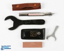 Selection of Hardy equipment, comprising: Hardy leather line cleaner; Hardy wetstone in leather