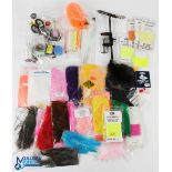 A small fly tying kit comprising: lever vice, bobbin holders, scissors, hooks, beads, thread and