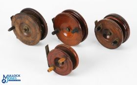 A collection of brass and mahogany fly reels, all complete and running well (4)
