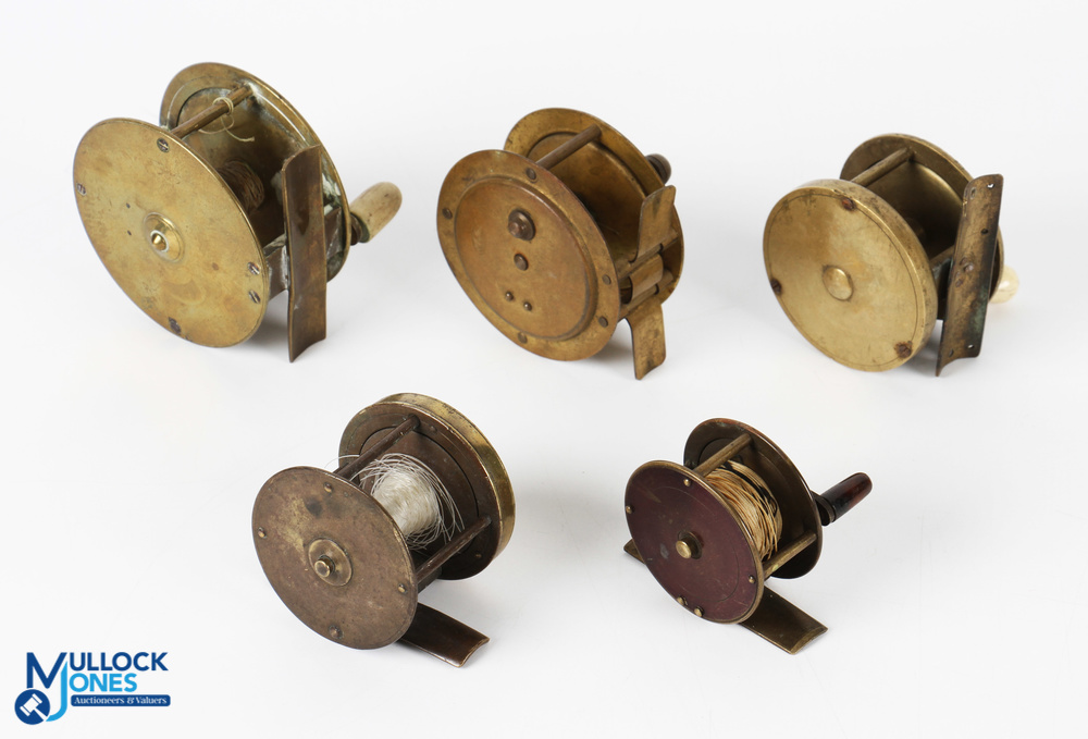 A collection of brass reels, as follows: 3" brass winch with cranked arm and white handle; 2.5" - Image 2 of 2