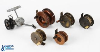 A collection of mixed types of reels, comprising: H Chamberlain Gun Maker brass winch, 2.5" spool