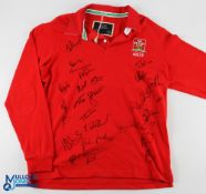 Signed Welsh Rugby Jersey: A fans' generic scarlet replica Wales jersey with three feathers logo,