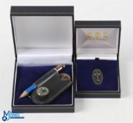 2003 PGA Cup Matches Silver Golf Set (2) - Garrard London Oval Silver Pin Badge in maker's case; and