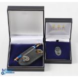 2003 PGA Cup Matches Silver Golf Set (2) - Garrard London Oval Silver Pin Badge in maker's case; and