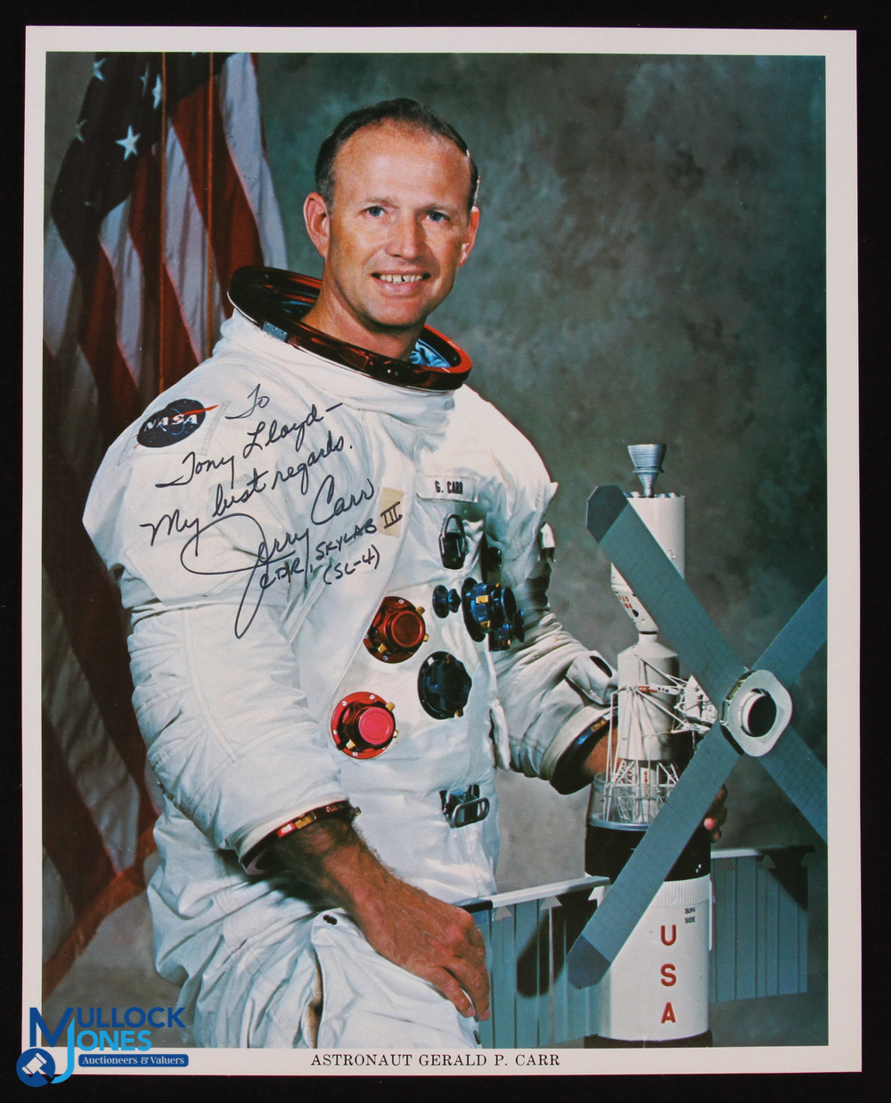 NASA - Gerald Carr - Skylab III - colour 10x8 showing him seated in space suit signed across the