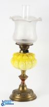 Yellow Embossed Glass Oil Lamp, with a clear transfer etched shade and chimney, with brass fitting