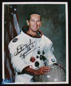 NASA - Charles Duke - Apollo 16 - colour 10x8 showing Duke seated in space suit signed across the