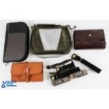 A collection of fly fishing equipment cases, as follows: Leather wallet with twin cover pockets,