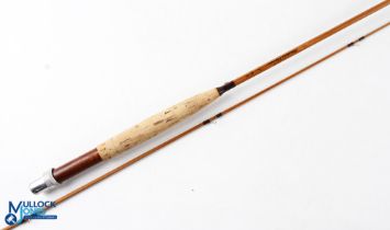 A 7' 2 piece impregnated split cane fly rod, butt section marked "Thomas Moran 7', #4/5, 3 3/4oz
