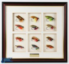 A fantastic 'man cave' salmon fly display - gut eye single flies, 12 in total from size 2/0 to 5/