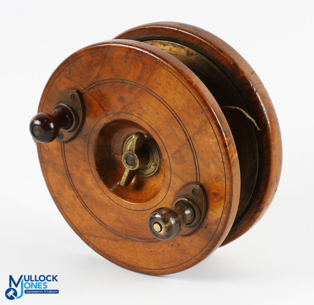 Mahogany and brass circle back Nottingham reel, 6" diameter, shaped cow horn handles, brass wing