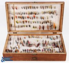 A large collection of sea trout and low water salmon double and single flies in 4-sided hinged