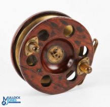 Unnamed Slater Future 6" Brass and Mahogany Reel with perforated face, twin polished horn handles,
