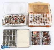 A collection of fly boxes with flies, as follows: Plano 2-sided clear view box with quantity of