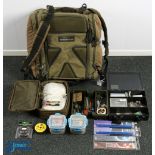 Fishing Korum Transition Compact Backpack. A multi pocket bag with coarse fishing contents, of shot,