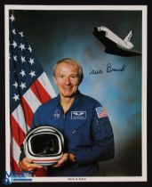 NASA - Vance Brand - Space Shuttle colour 10x8 showing him standing signed across the image