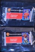 Manchester United Phonecard Collection - a collection of 17 unused cards in an album