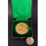 EDWARDIAN GILT METAL MEDALLION inscribed 'In memory of a hero of the Indian Army, this medal was