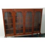 WYLIE & LOCHHEAD MAHOGANY BREAKFRONT CABINET with a moulded top above four astragal glazed doors
