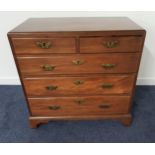 GEORGE III MAHOGANY CHEST OF DRAWERS with a moulded top above two short and three long graduated