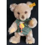 STEIFF BRUMMBAR TEDDY BEAR with a red neck bow and floral bowtie and waistcoat, with jointed limbs