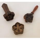 SET OF MILLINERY TOOLS for felting, including an iron flower head felt cutter, and an iron flower