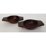 PAIR OF SCOTTISH TREEN QUAICHS each of one piece construction with a circular bowl with a lip and