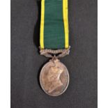 GEORGE VI EFFICIENCY MEDAL with Territorial clasp, named to 2976425 GNR. L. Hamilton. R.A. with