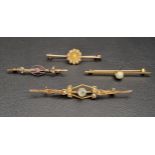 FOUR NINE CARAT GOLD BAR BROOCHES comprising an aquamarine and seed pearl brooch, another with