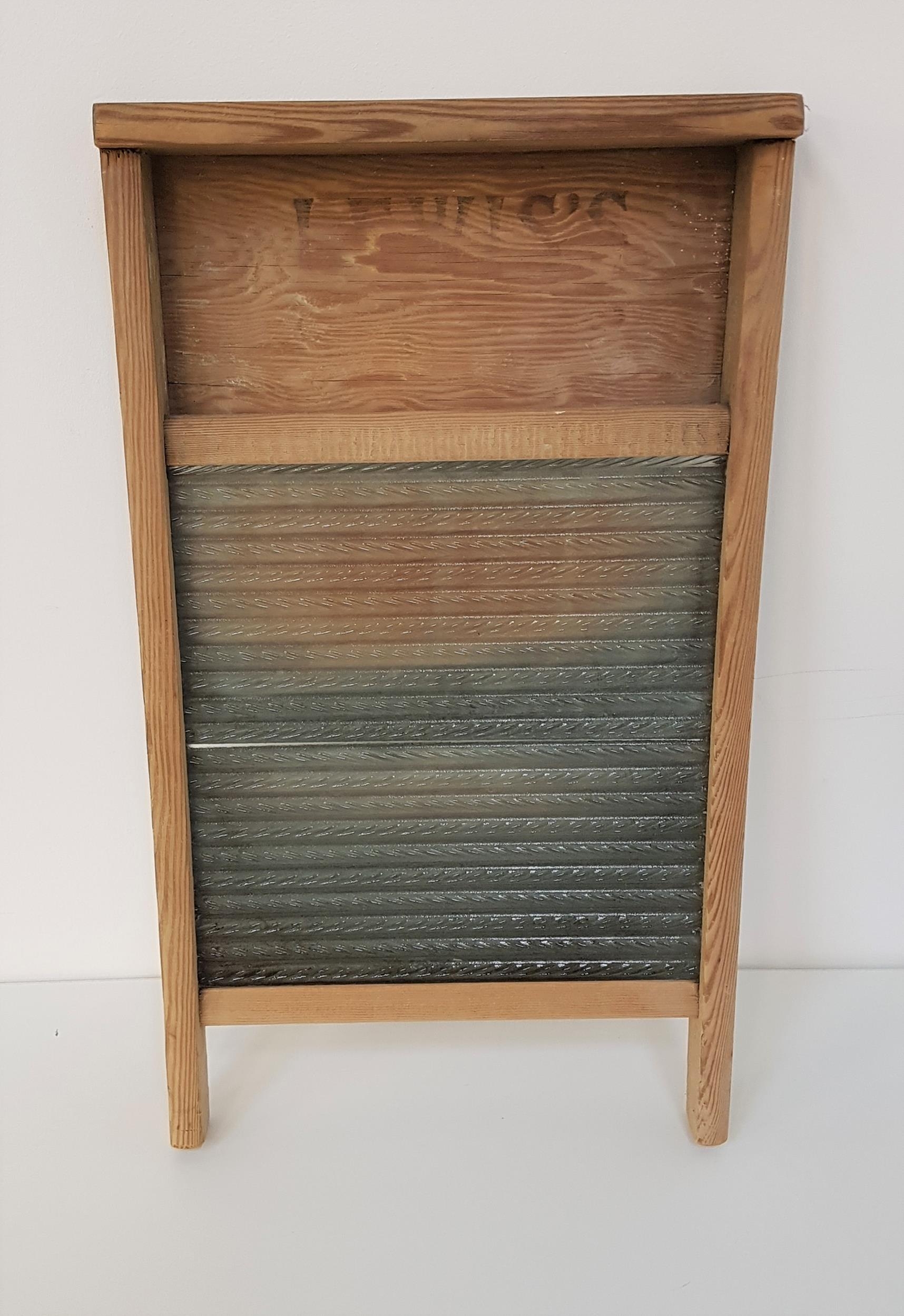 VINTAGE PINE FRAME WASHBOARD with a serrated glass panel, marked Lewis's, 54.5cm high