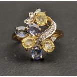 DIAMOND AND BLUE AND YELLOW GEM SET CLUSTER DRESS RING the blue and yellow gemstones believed to