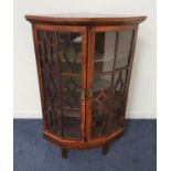 19th CENTURY MAHOGANY CORNER DISPLAY CABINET with a moulded top above a pair of glass panelled doors