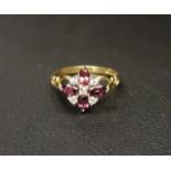 RHODALITE AND DIAMOND CLUSTER RING the four marquise cut rhodalites totalling approximately 0.