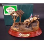 THE CRAFTSMAN STUDIO COLLECTION Eventing, a metal model of a cross country rider at a water jump, on
